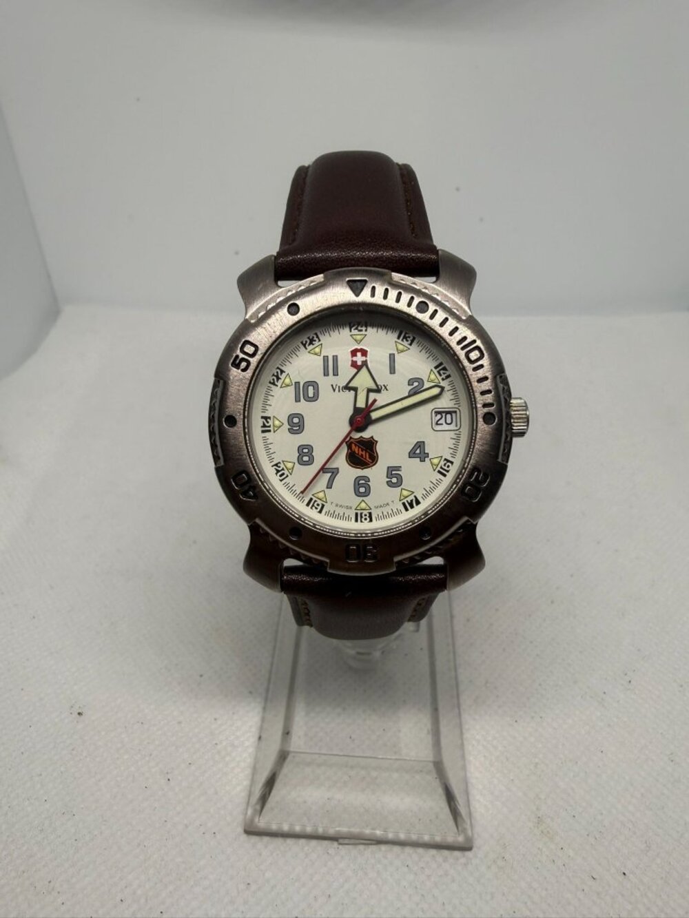 Victorinox Swiss Army NHL Men's White Dial Rotating Bezel Brown Leather Watch